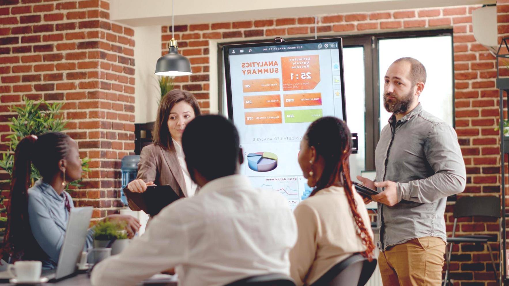 VoltLinkSys team collaborating in office environment